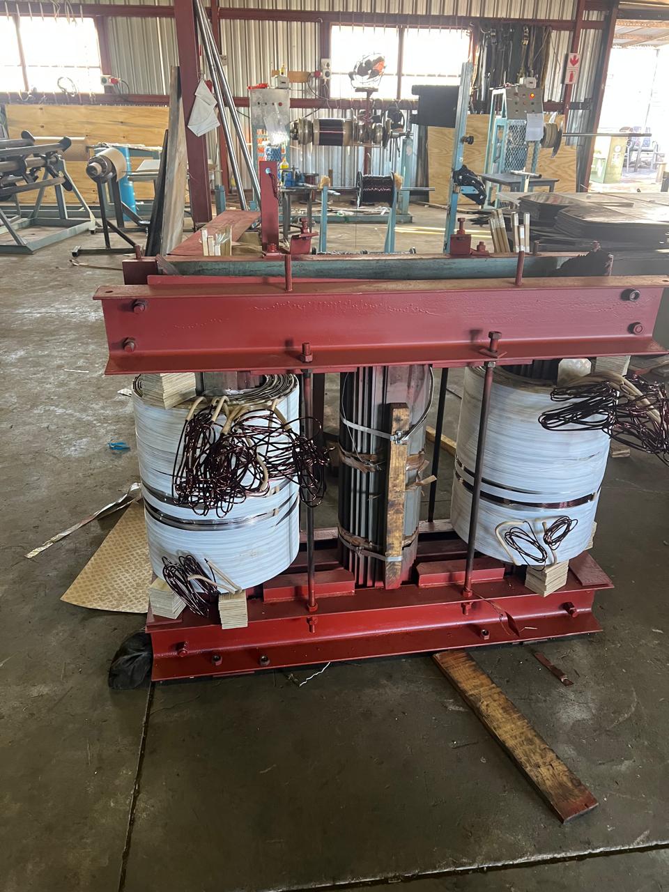 Transformer core and coil assembly being rebuilt in the workshop