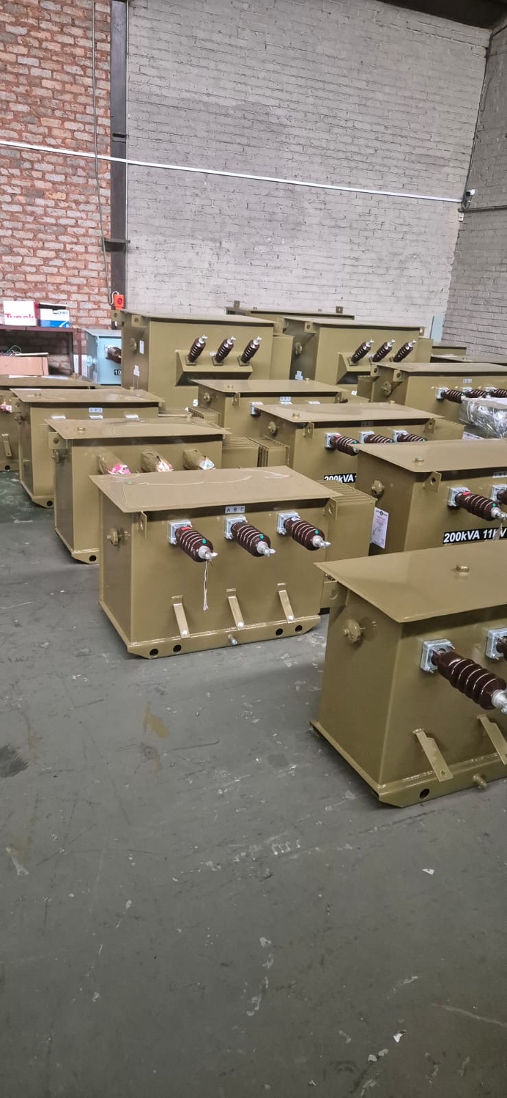 Distribution transformers ready for delivery at the TNA workshop